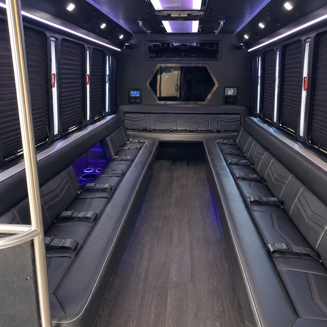 Wedding guests seated inside a party bus serving Chandler